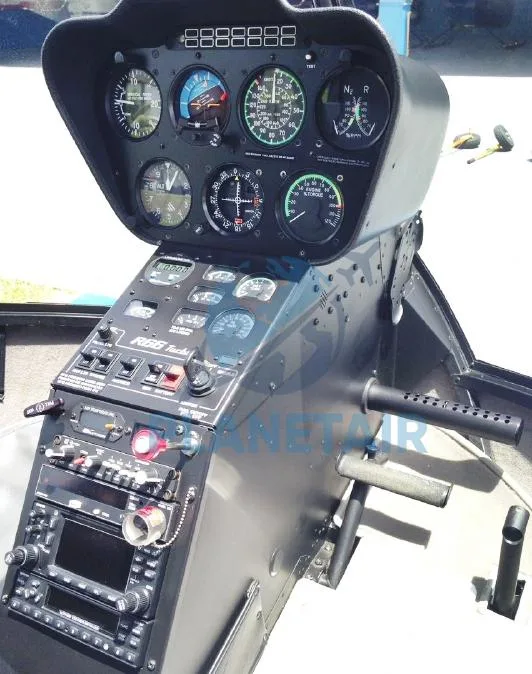 Cockpit and instrument panel of a 2014 Robinson R66 Turbine.