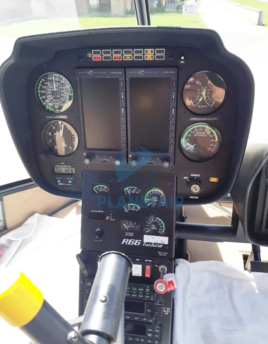 Cockpit and instrument panel of a 2014 Robinson R66 Turbine.
