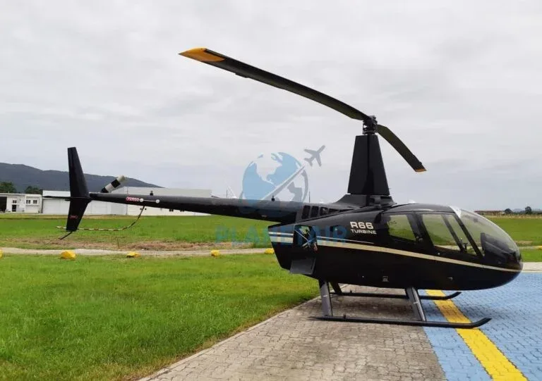 Exterior view of a 2014 Robinson R66 Turbine.