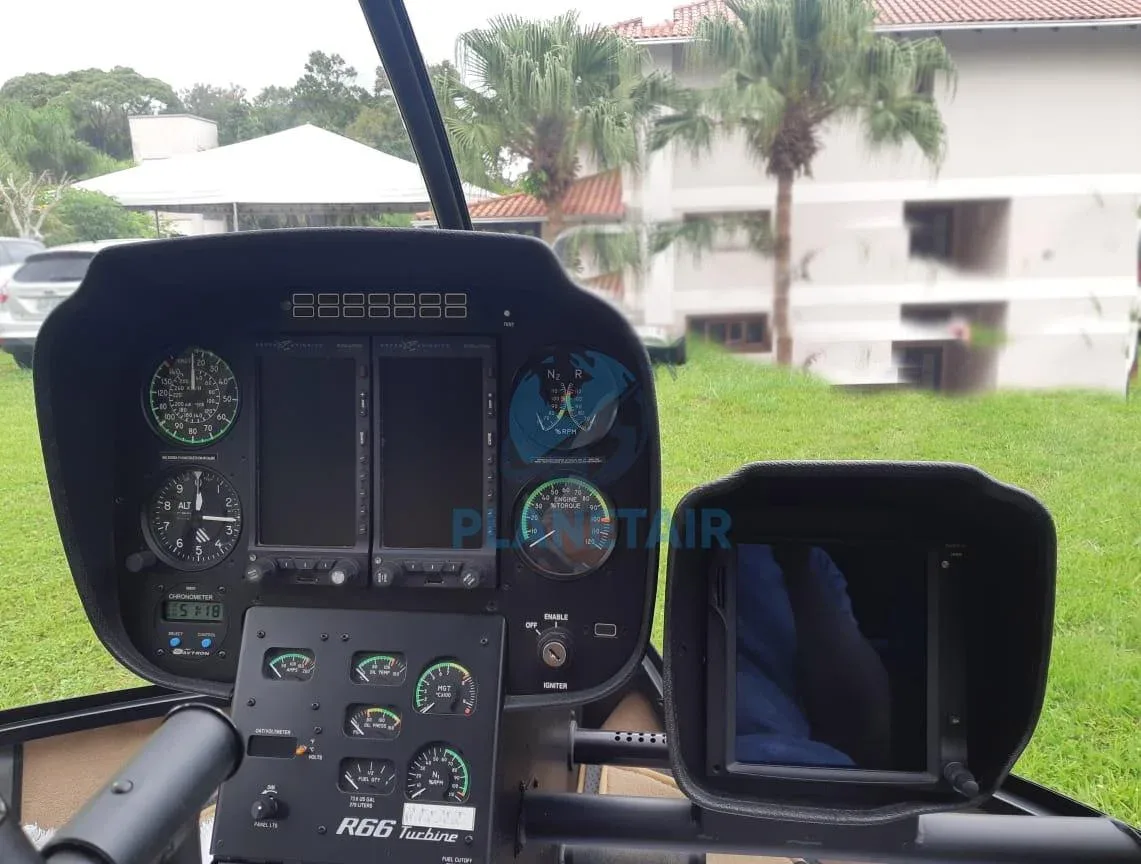 Cockpit and instrument panel of a 2014 Robinson R66 Turbine.