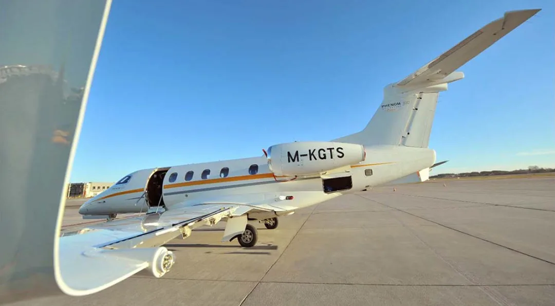 Exterior view of a 2014 Embraer PHENOM 300.