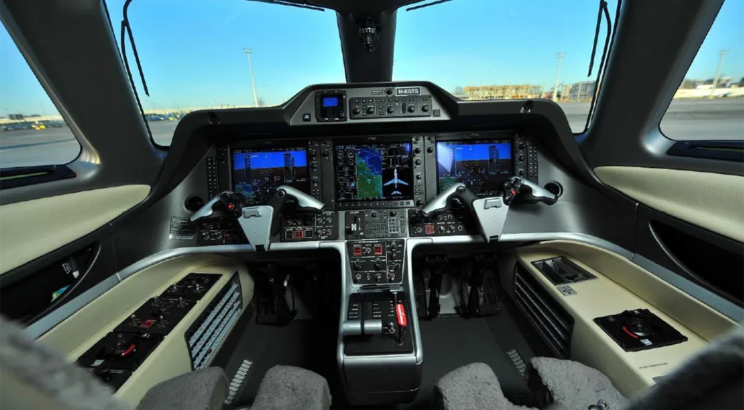Cockpit and instrument panel of a 2014 Embraer PHENOM 300.