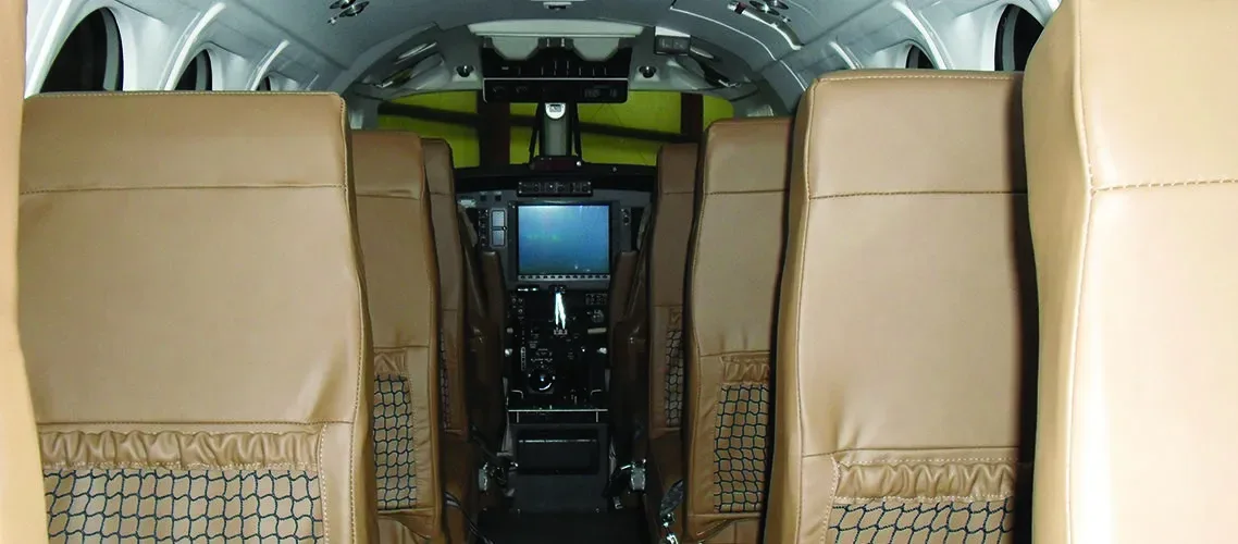 Cabin interior of a 2002 Beechcraft King Air B200 Blackhawk -61’s Raisbeck Cargo Pod.