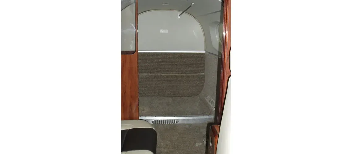 Cabin interior of a 2002 Beechcraft King Air B200 Blackhawk -52A’s Garmin G1000 NXI Raisbeck Swept Tip Props.