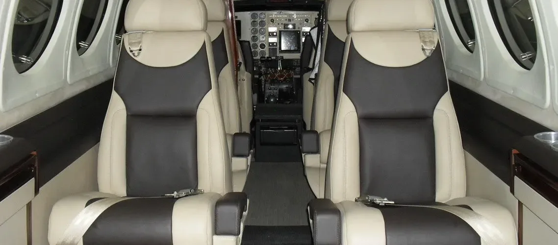 Cabin interior of a 2002 Beechcraft King Air B200 Blackhawk -52A’s Garmin G1000 NXI Raisbeck Swept Tip Props.