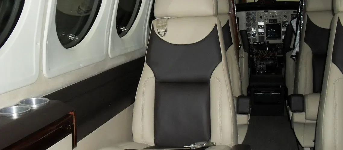 Cabin interior of a 2002 Beechcraft King Air B200 Blackhawk -52A’s Garmin G1000 NXI Raisbeck Swept Tip Props.
