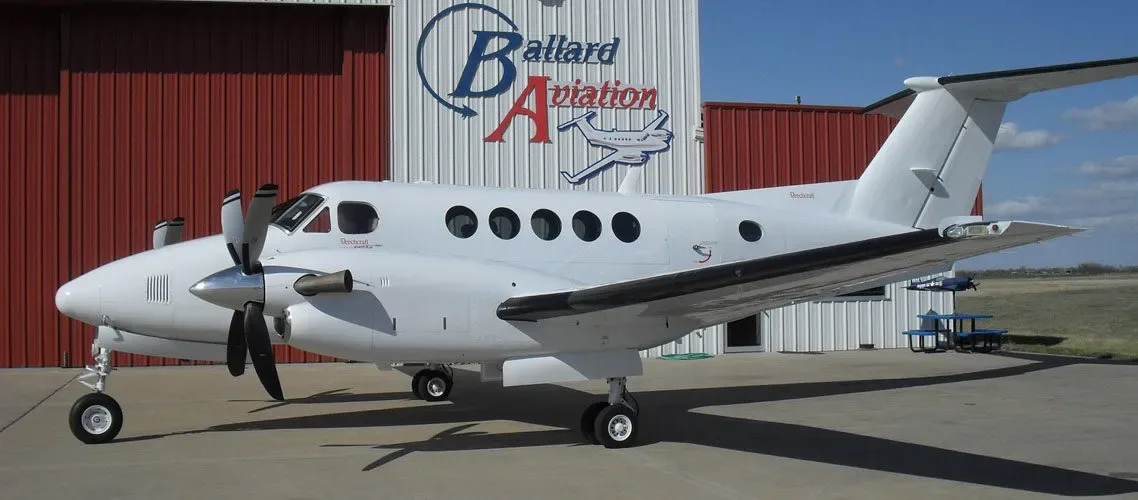 Exterior view of a 2002 Beechcraft King Air B200 Blackhawk -52A’s Garmin G1000 NXI Raisbeck Swept Tip Props.