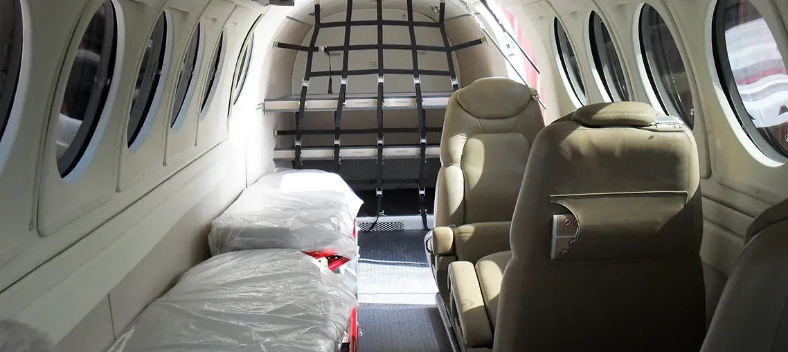 Cabin interior of a 2004 Beechcraft King Air B200 Blackhawk -52’s Collins Proline 21 Raisbeck Winglockers & Strakes.