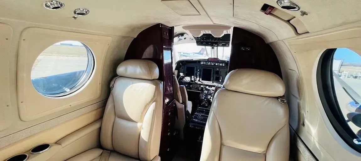 Cabin interior of a 2005 Beechcraft King Air B200 -42’s Garmin G1000 NXI Raisbeck.