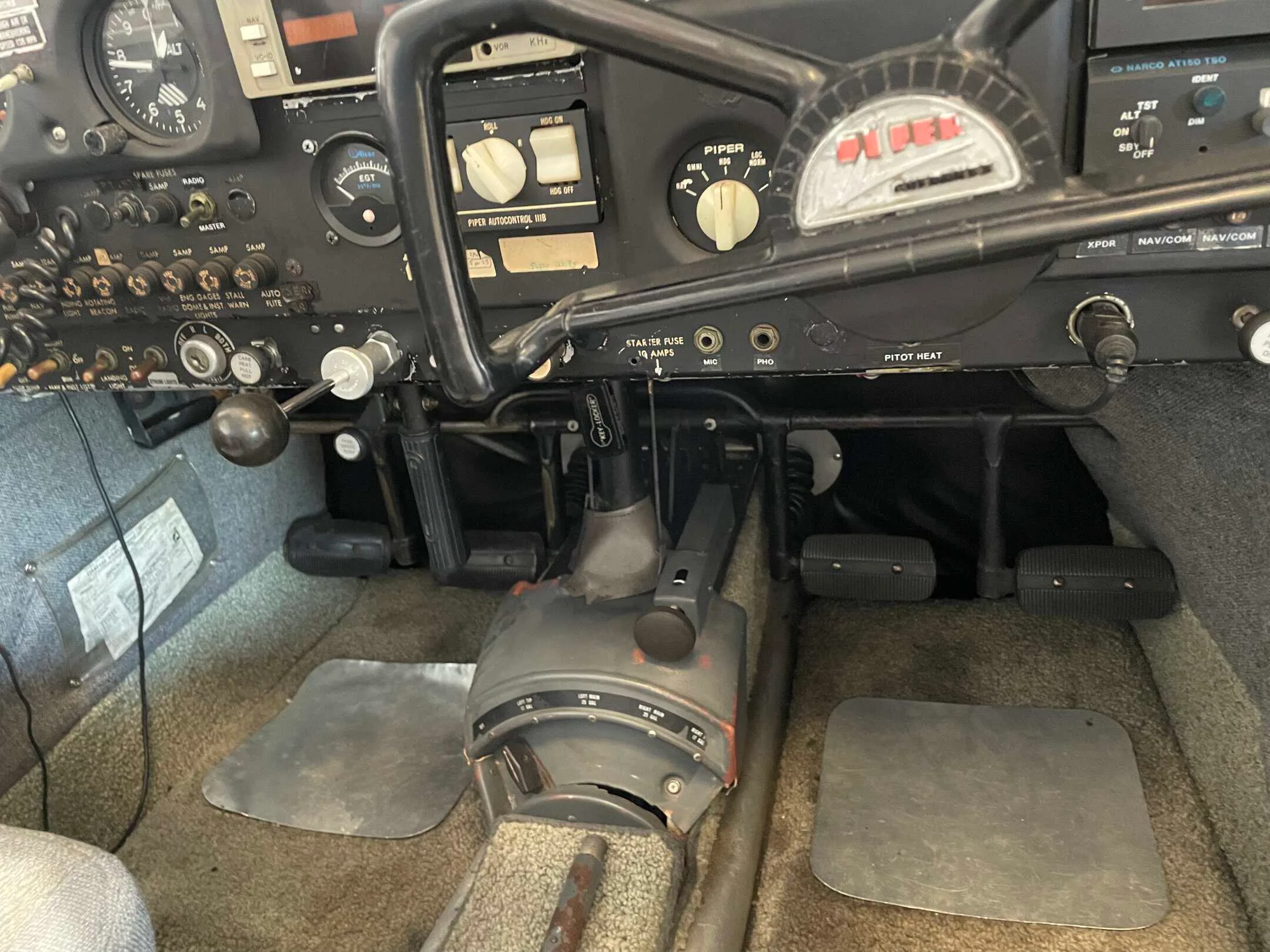Cockpit and instrument panel of a 1964 Piper Cherokee 235.