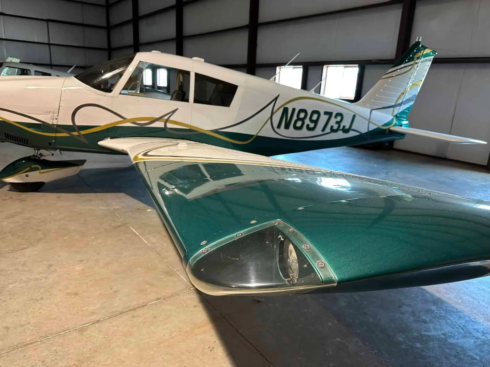Exterior view of a 1965 Piper Cherokee 180.
