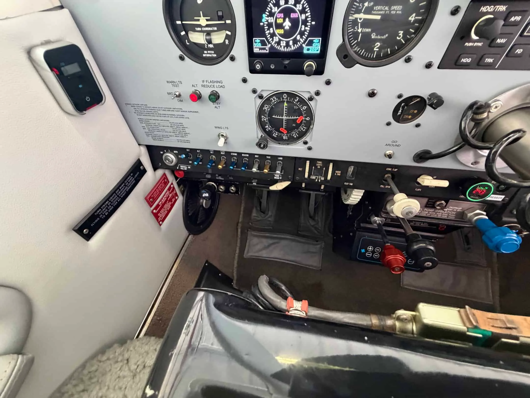 Cockpit and instrument panel of a 1979 Beech F33A With TN & FTA Airconditioning.
