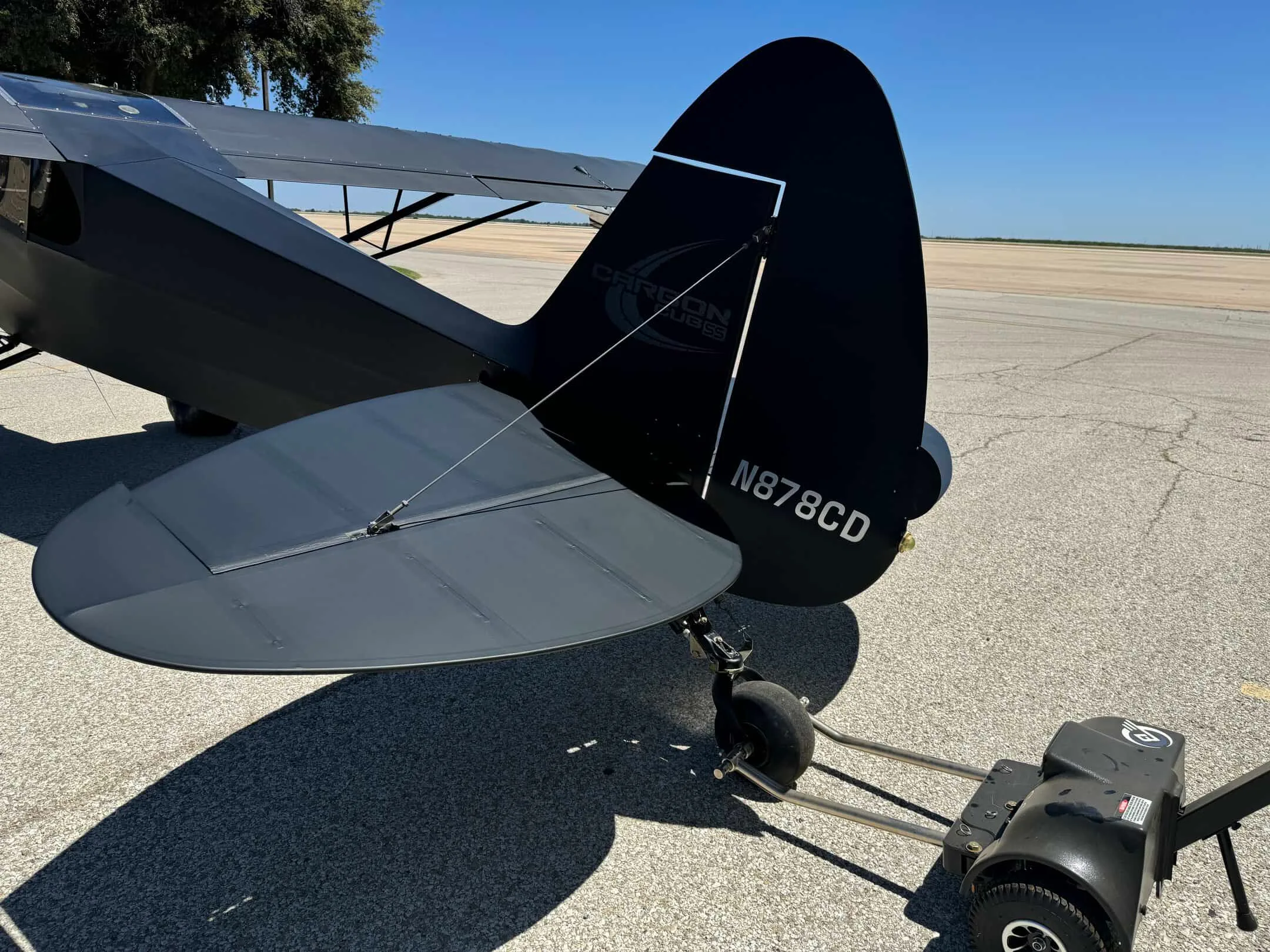 Exterior view of a 2012 CubCrafters Carbon Cub SS, N878CD.