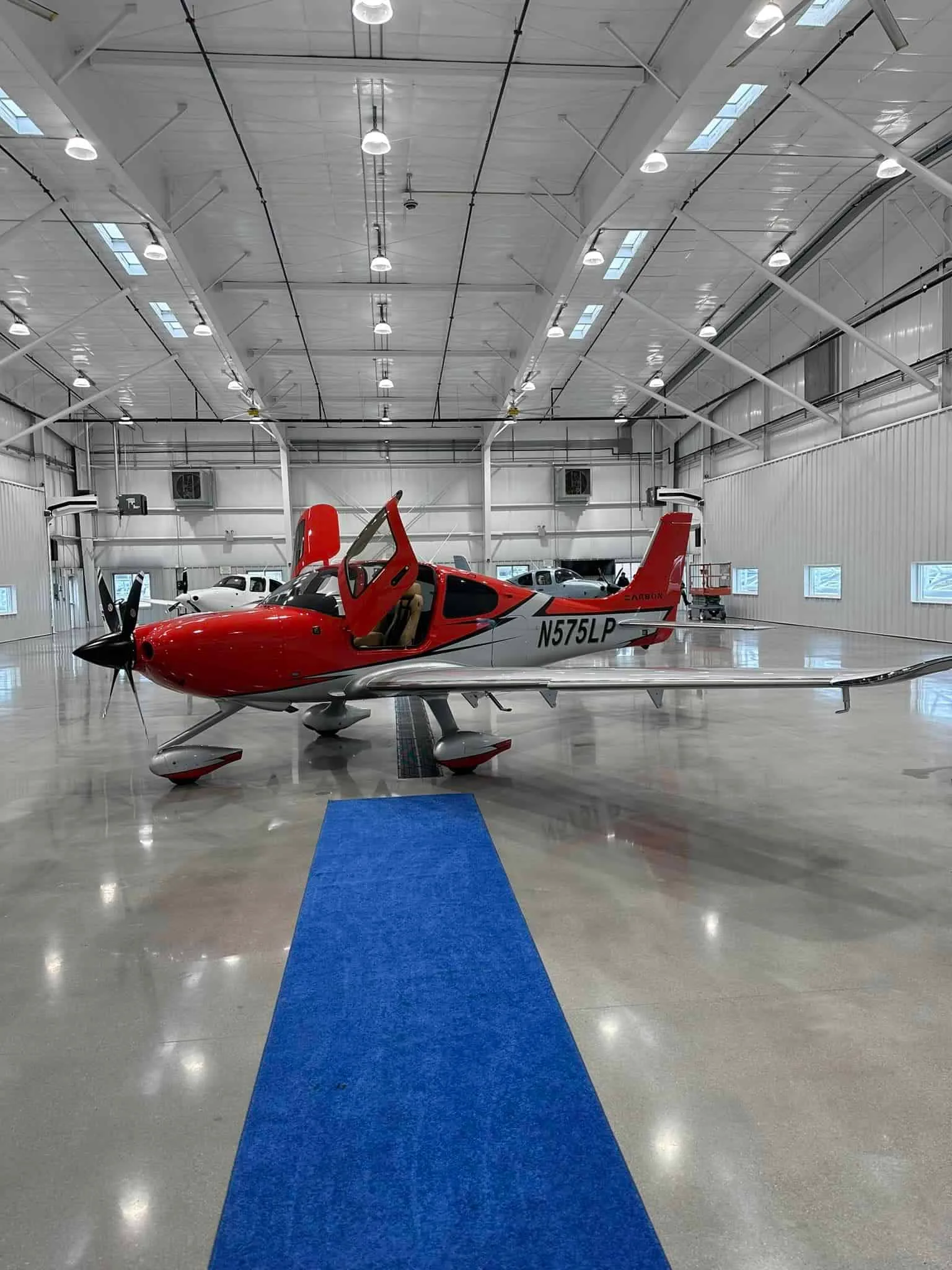 Exterior view of a 2023 Cirrus SR22T G6 GTS, N575LP.