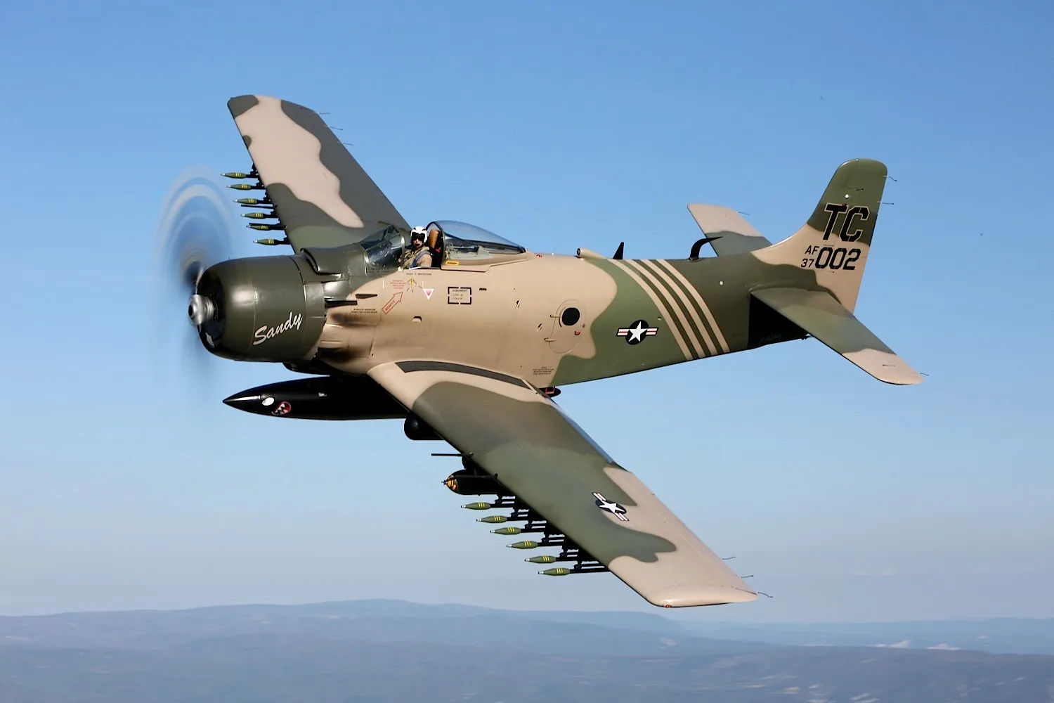 Marketing image of a 1951 Douglas AD-4 SKYRAIDER.