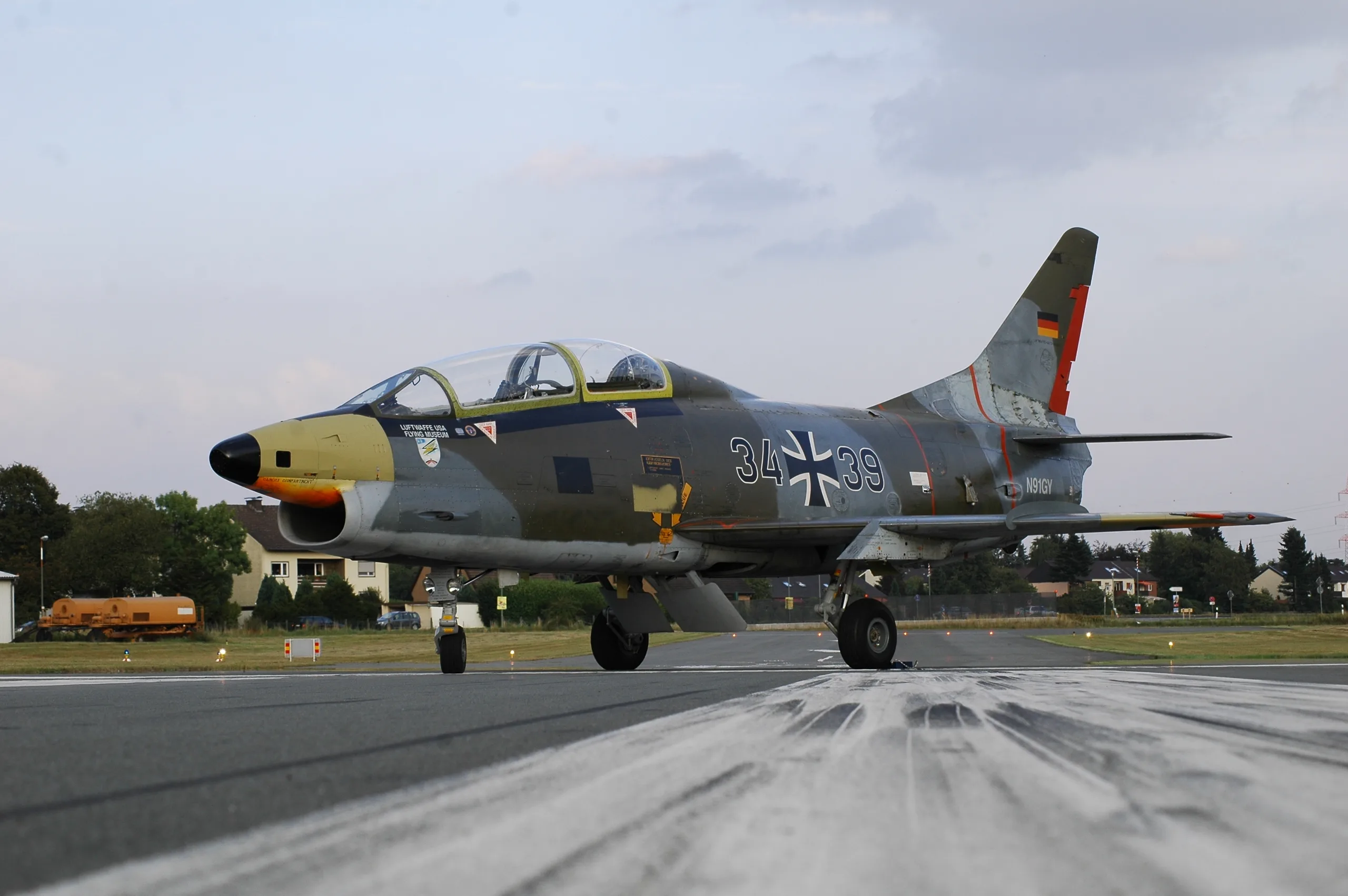 Marketing image of a 1963 FIAT G.91 / T.3.