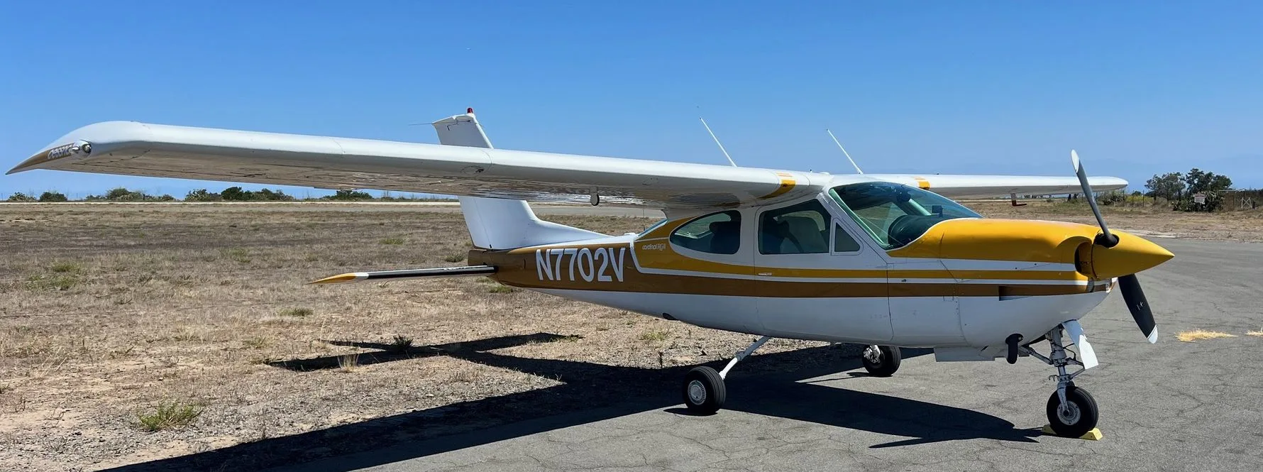 Exterior view of a 1976, N7702V.