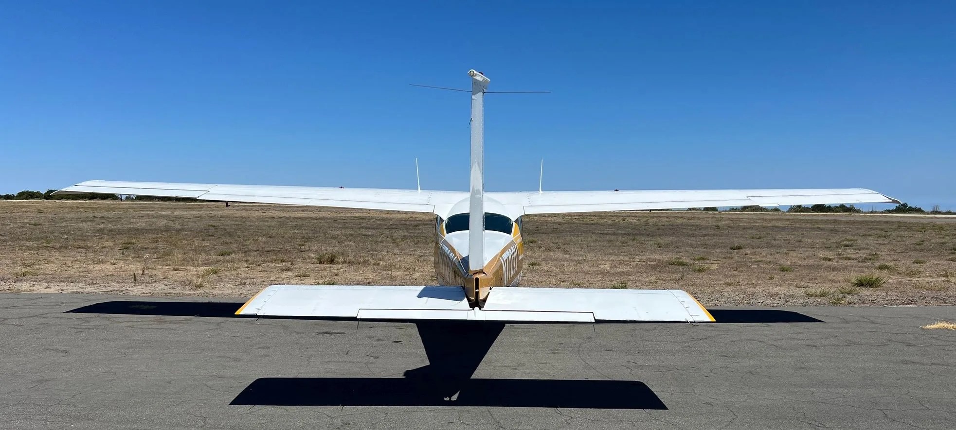 Exterior view of a 1976, N7702V.