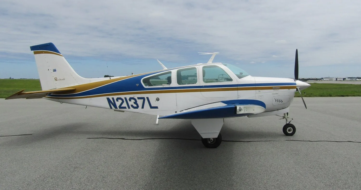 Exterior view of a 1976 Beechcraft N2137L 1976 F33A Bonanza.
