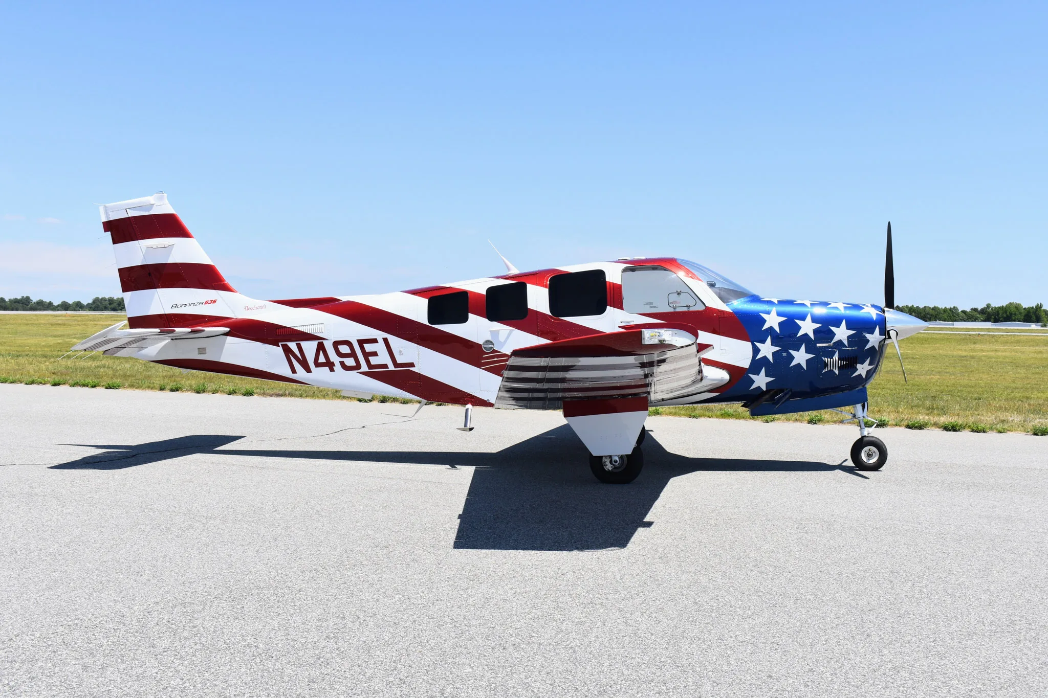 Exterior view of a 1991 Beechcraft Bonanza A36 * 405,000 with Bonanza School.
