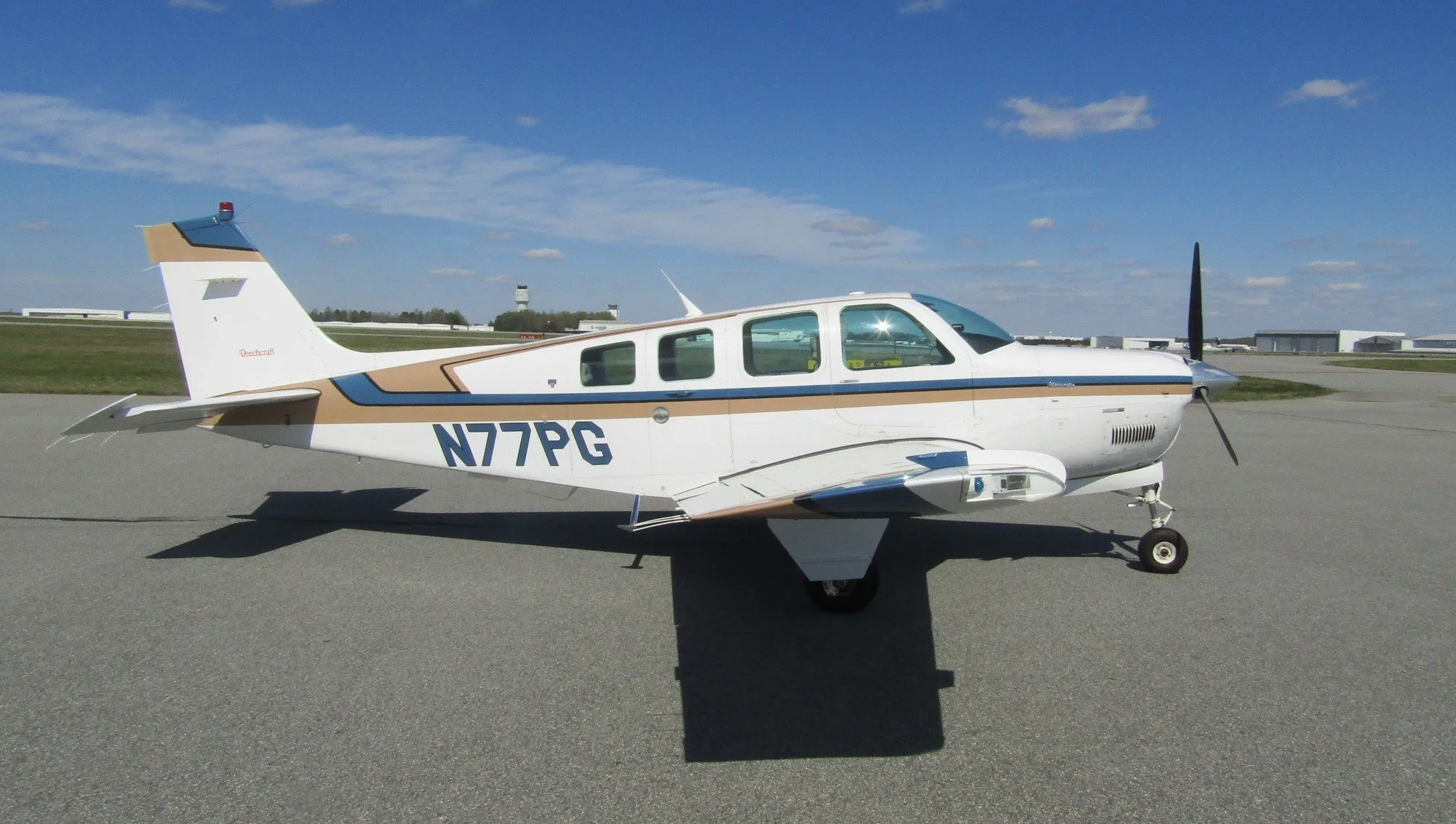 Exterior view of a 1991 Beechcraft Bonanza A36 * 405,000 with Bonanza School.