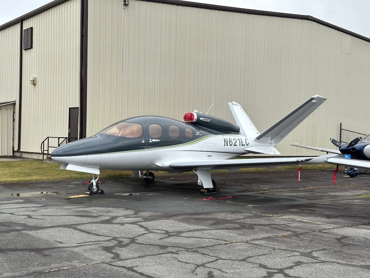 Exterior view of a 2020 Cirrus SF50 G2 Vision Jet, N621LC.