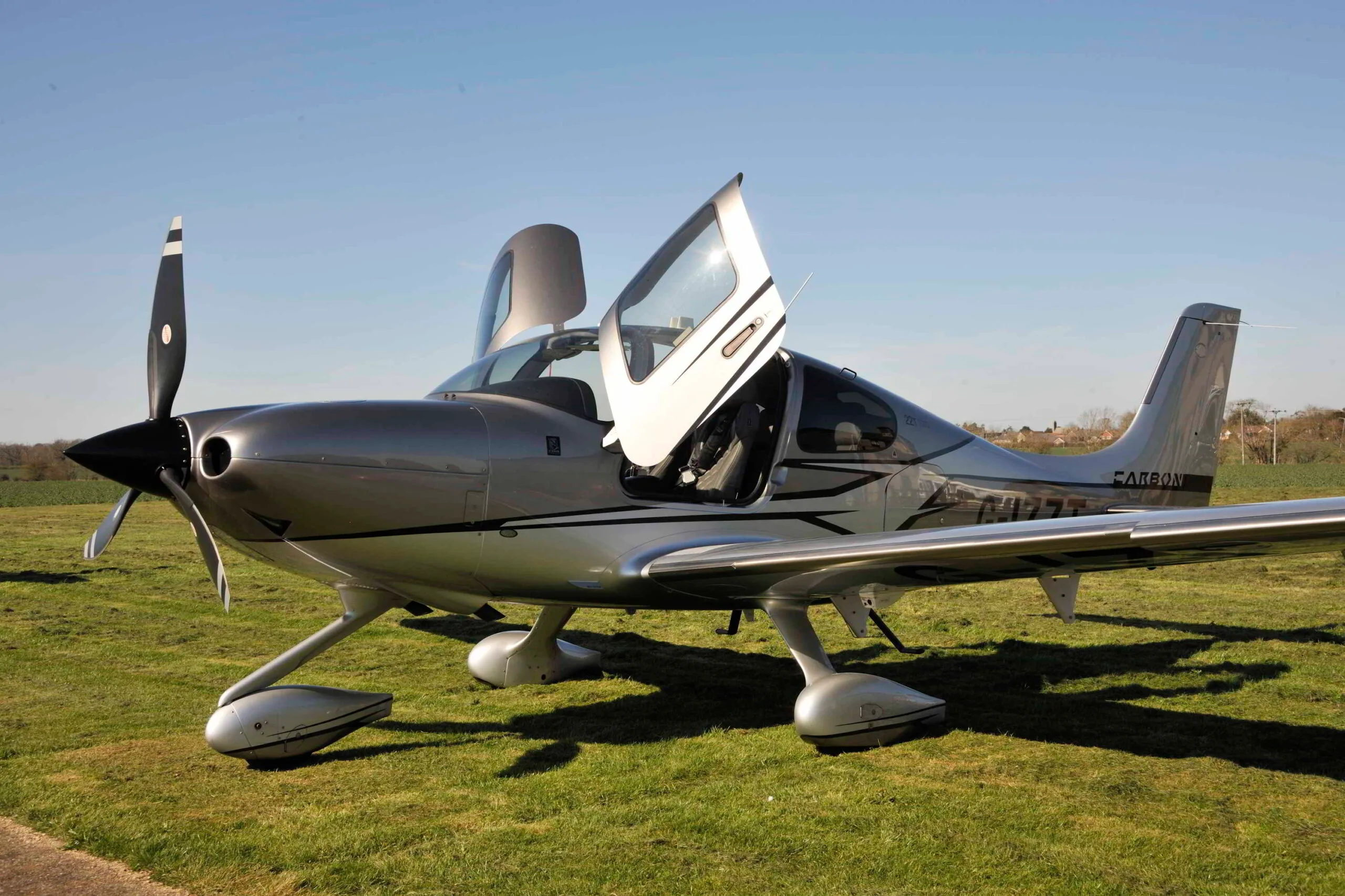 Exterior view of a 2018 Cirrus SR22T GTS G6 FIKI, G-IZZT.