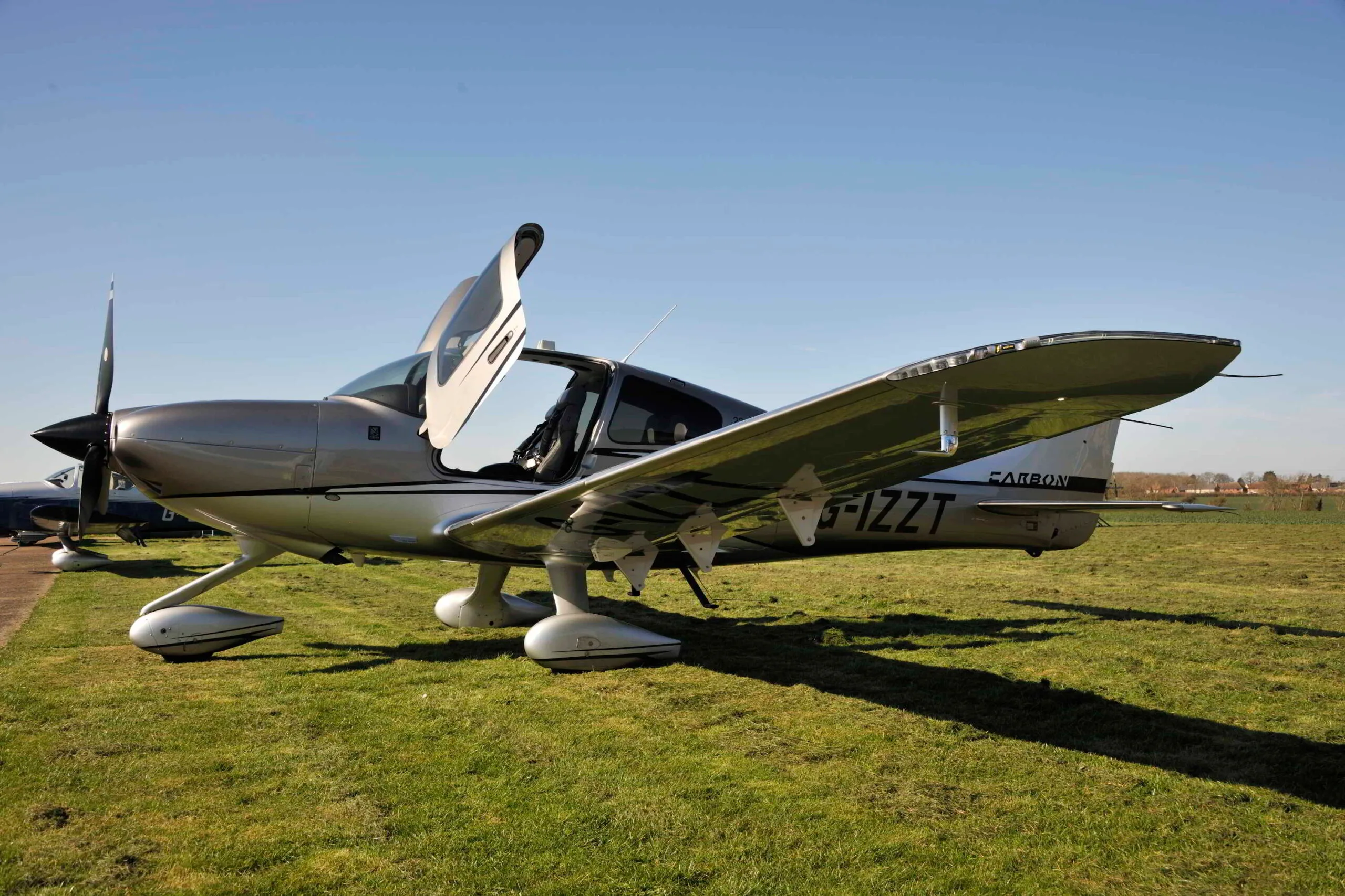 Exterior view of a 2018 Cirrus SR22T GTS G6 FIKI, G-IZZT.