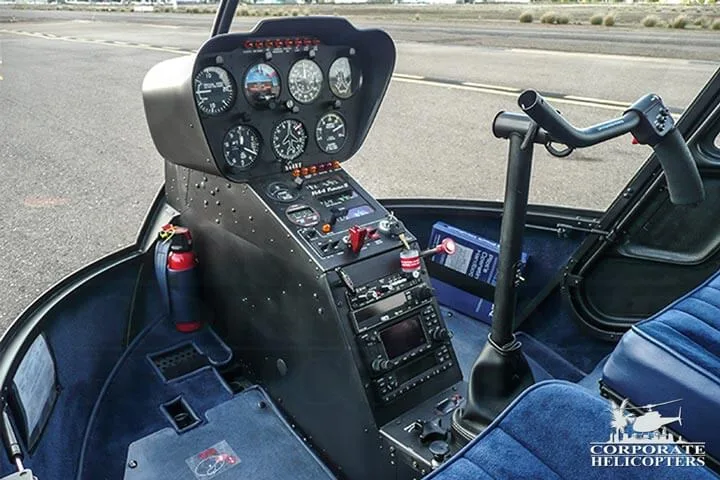 Cockpit and instrument panel of a 2007 Robinson R44 Raven II.