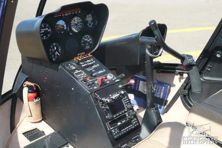 Cockpit and instrument panel of a 2009 Robinson R44 Clipper II.