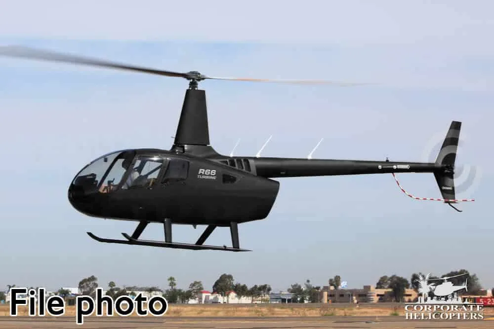 Exterior view of a 2017 Robinson R66, N10ZH.