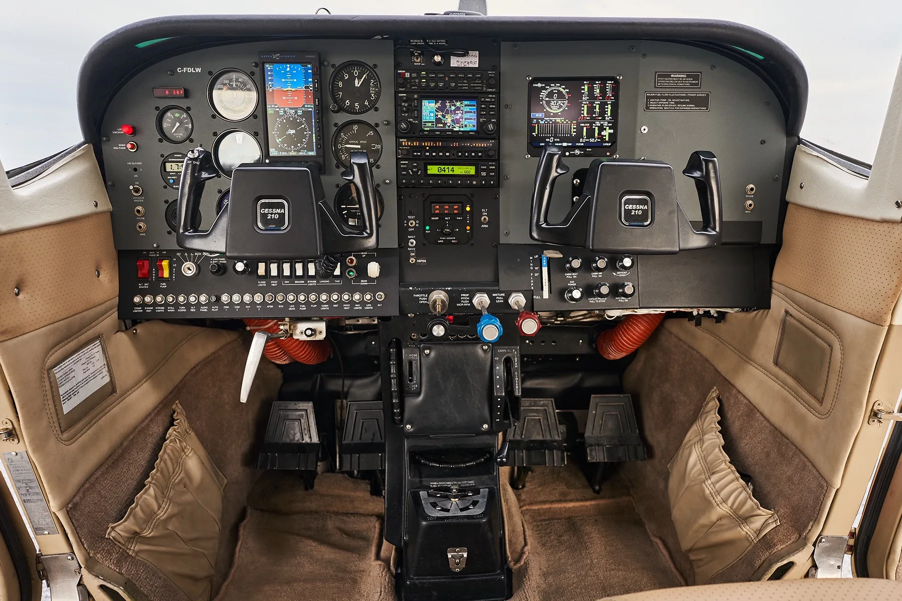 Cockpit and instrument panel of a 1973 Cessna Turbo 210 - Canadian Aircraft Sales.