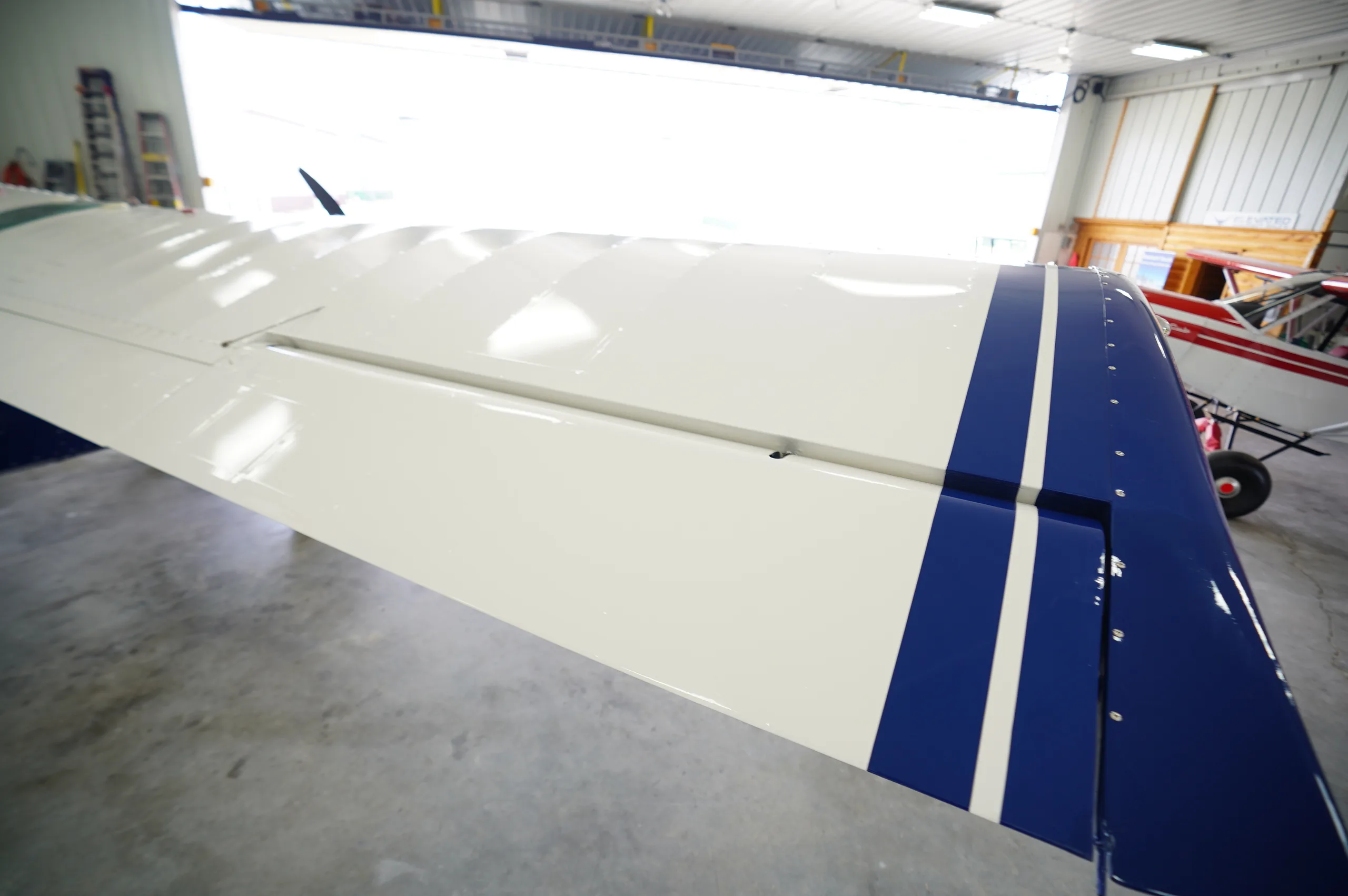 Exterior view of a 2007 Aviat Husky, N928NH.