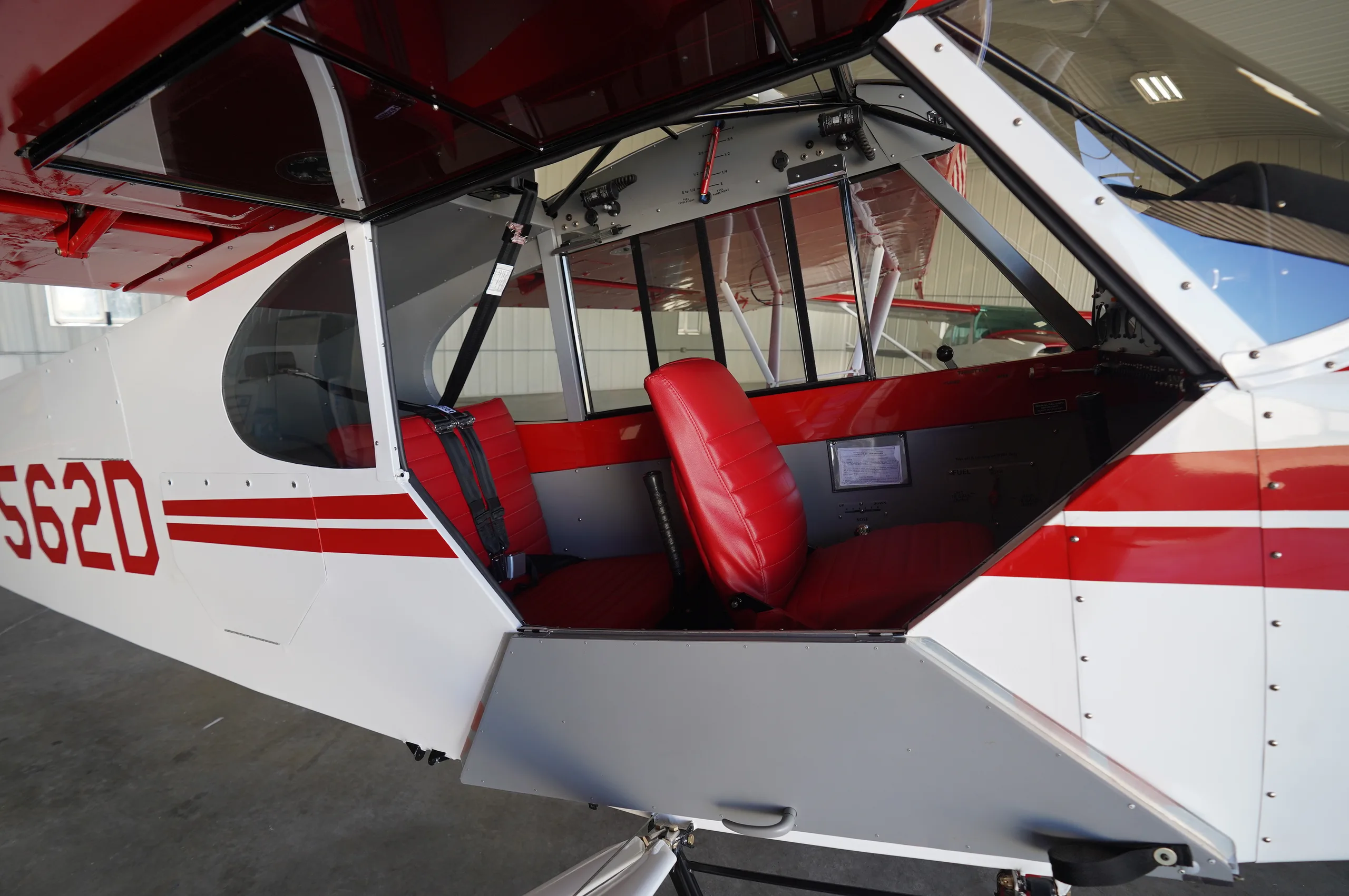 Cockpit and instrument panel of a 1957 Piper super cub.