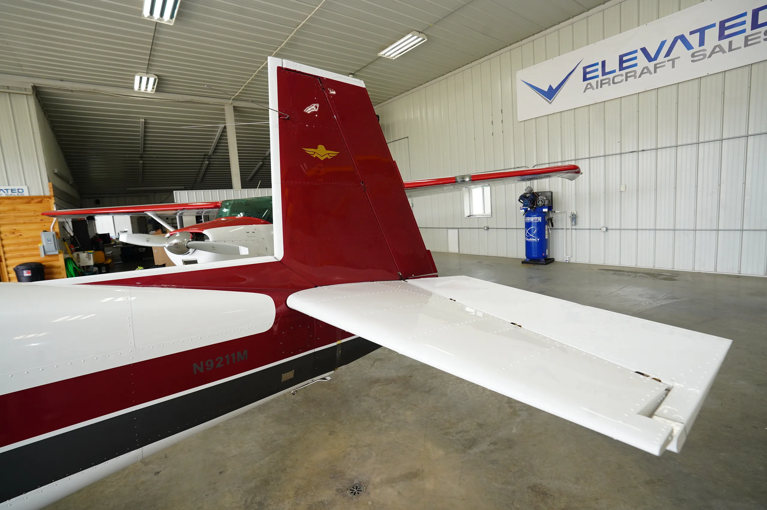 Exterior view of a Mooney M20C, N9211M.
