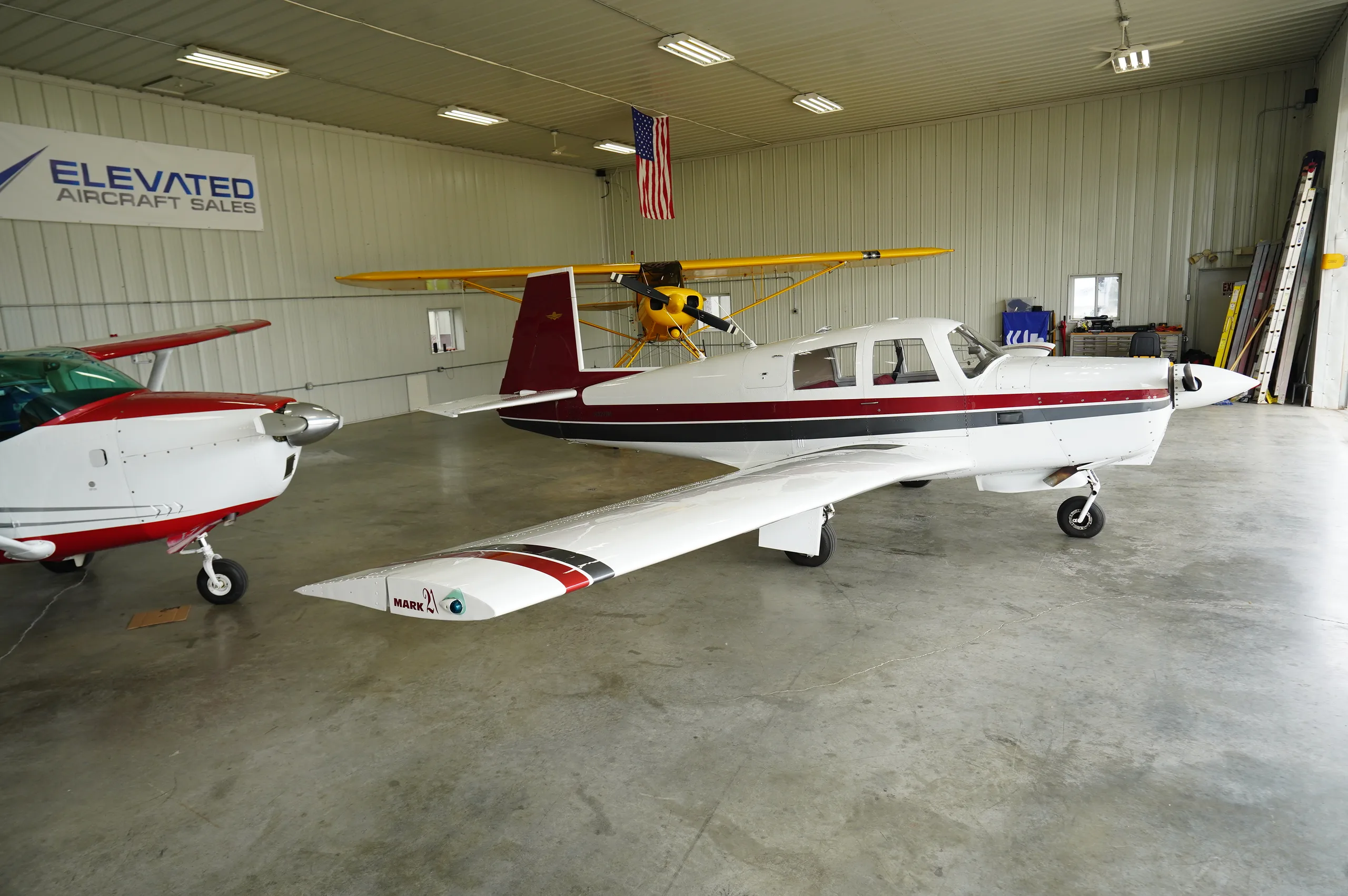 Exterior view of a Mooney M20C, N9211M.