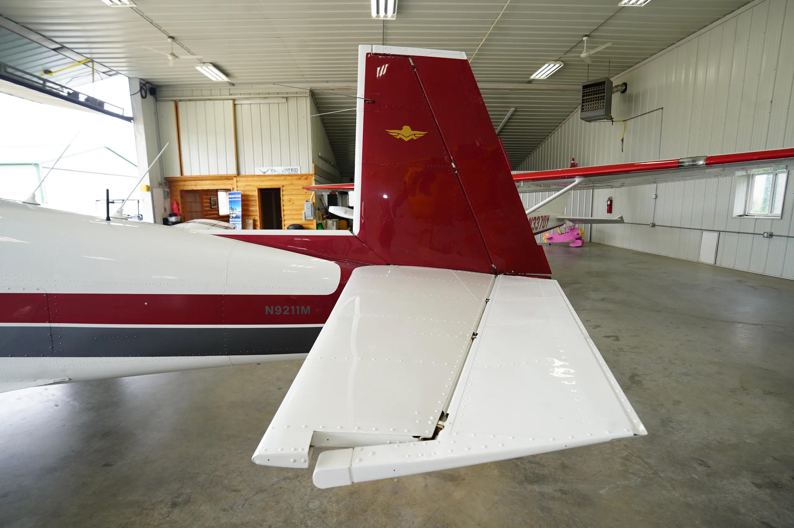 Exterior view of a Mooney M20C, N9211M.