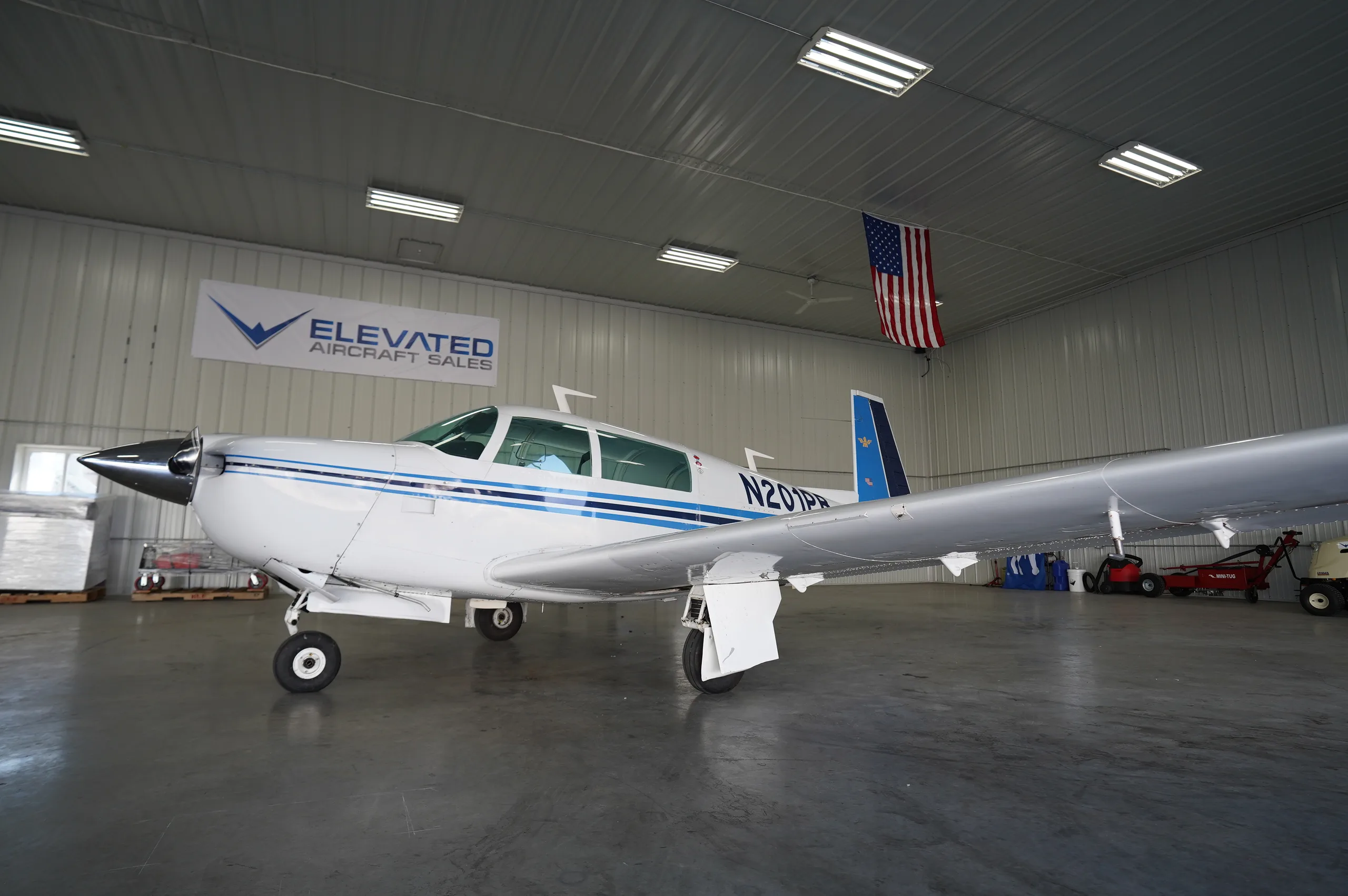 Exterior view of a 1977 Mooney M20J 201, N201PB.