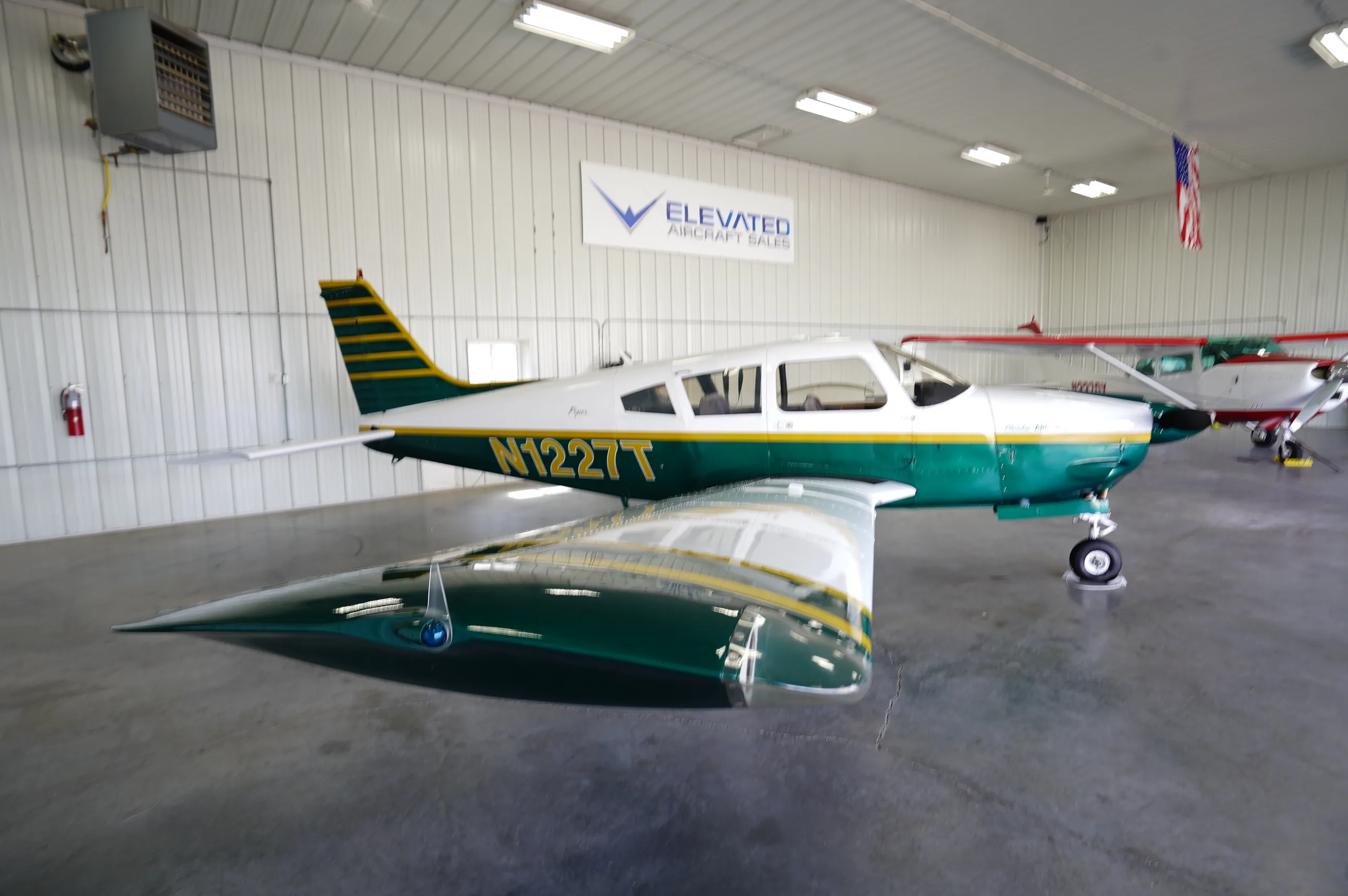 Exterior view of a 1972 Piper Archer II, N1227T.