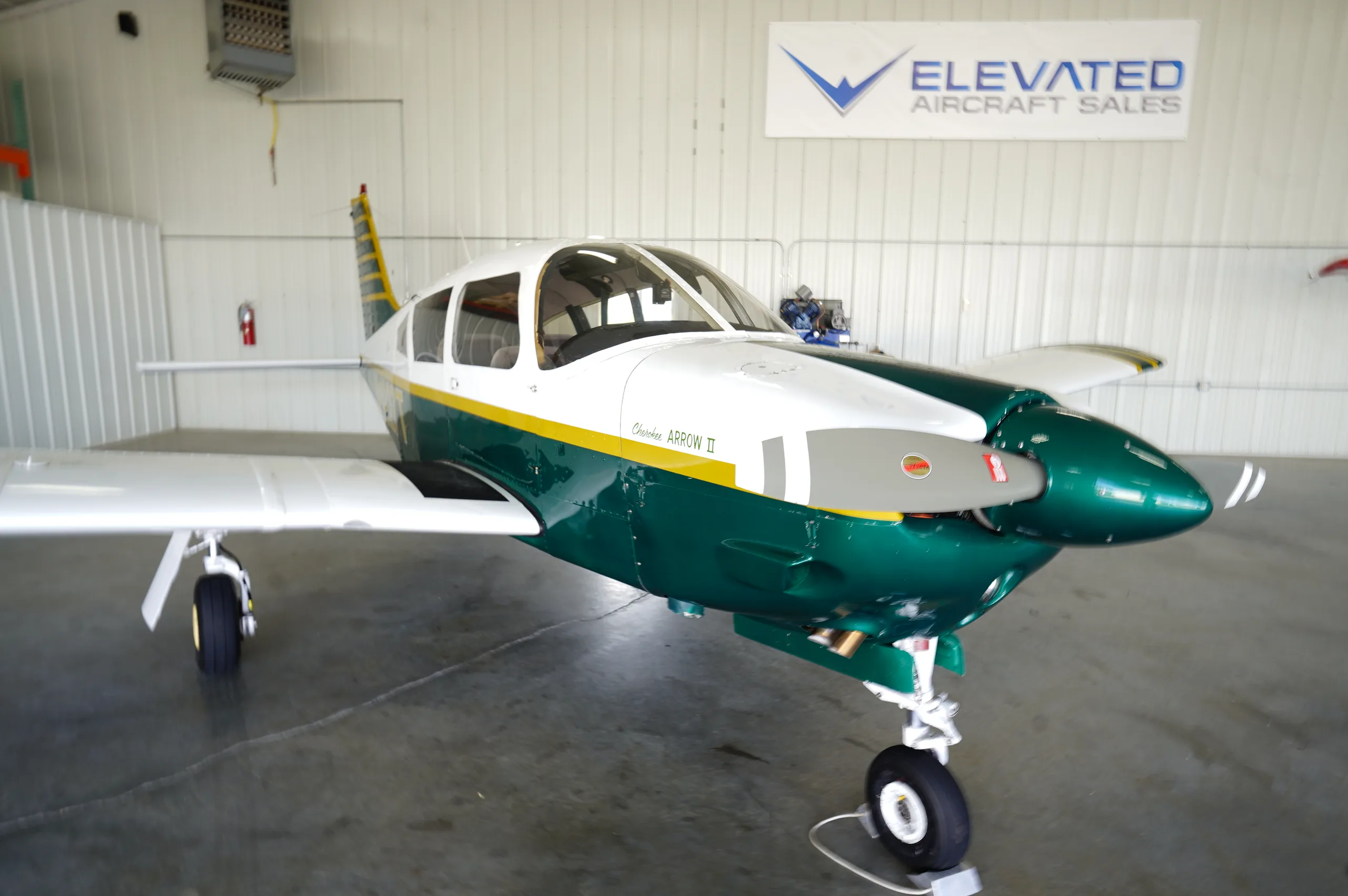 Exterior view of a 1972 Piper Archer II, N1227T.