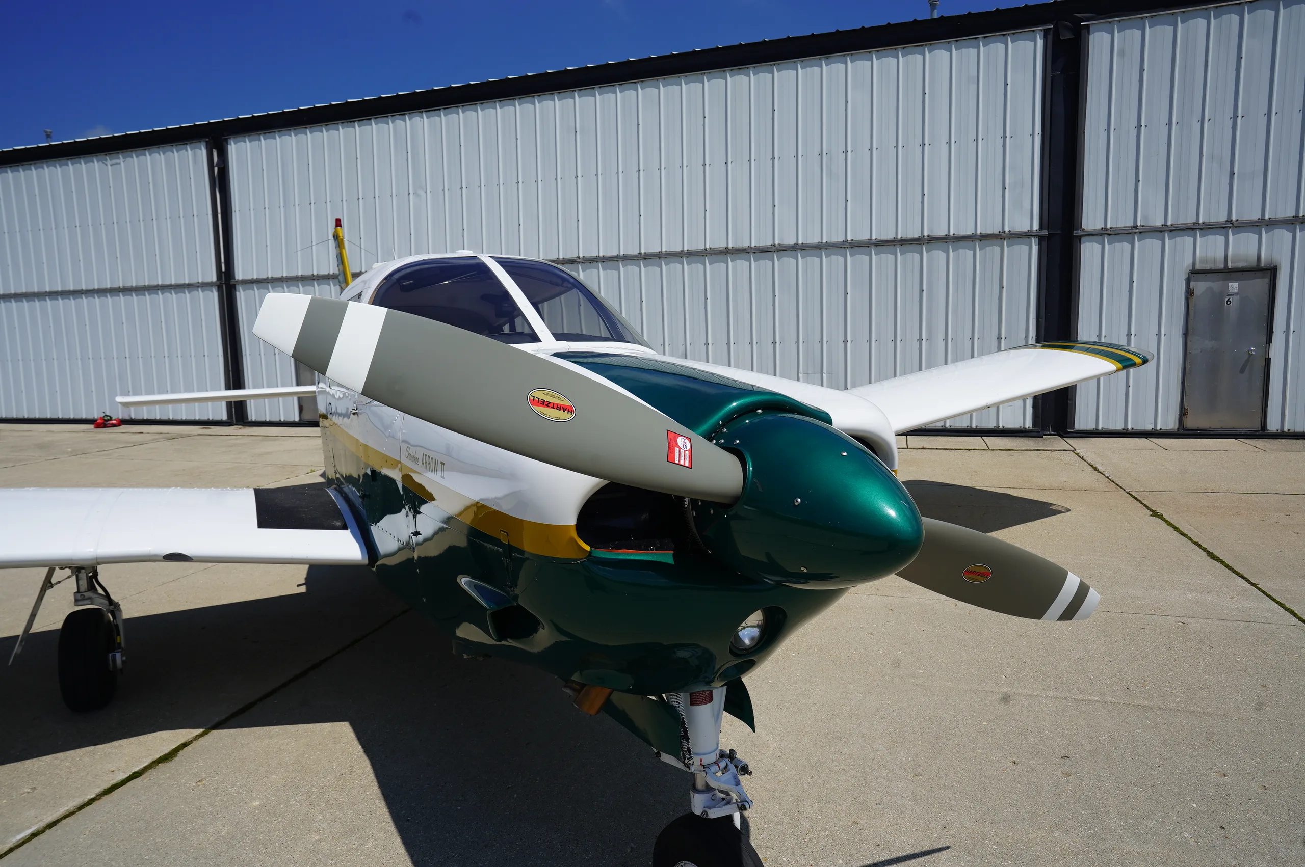 Exterior view of a 1972 Piper Arrow II, N1227T.
