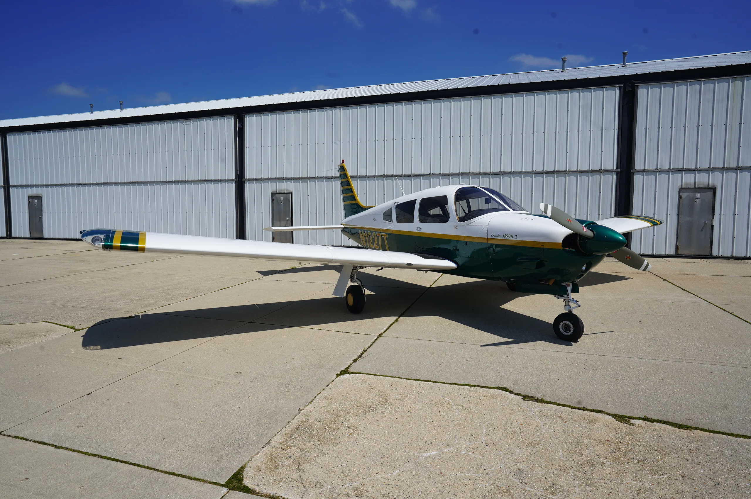 Exterior view of a 1972 Piper Arrow II, N1227T.