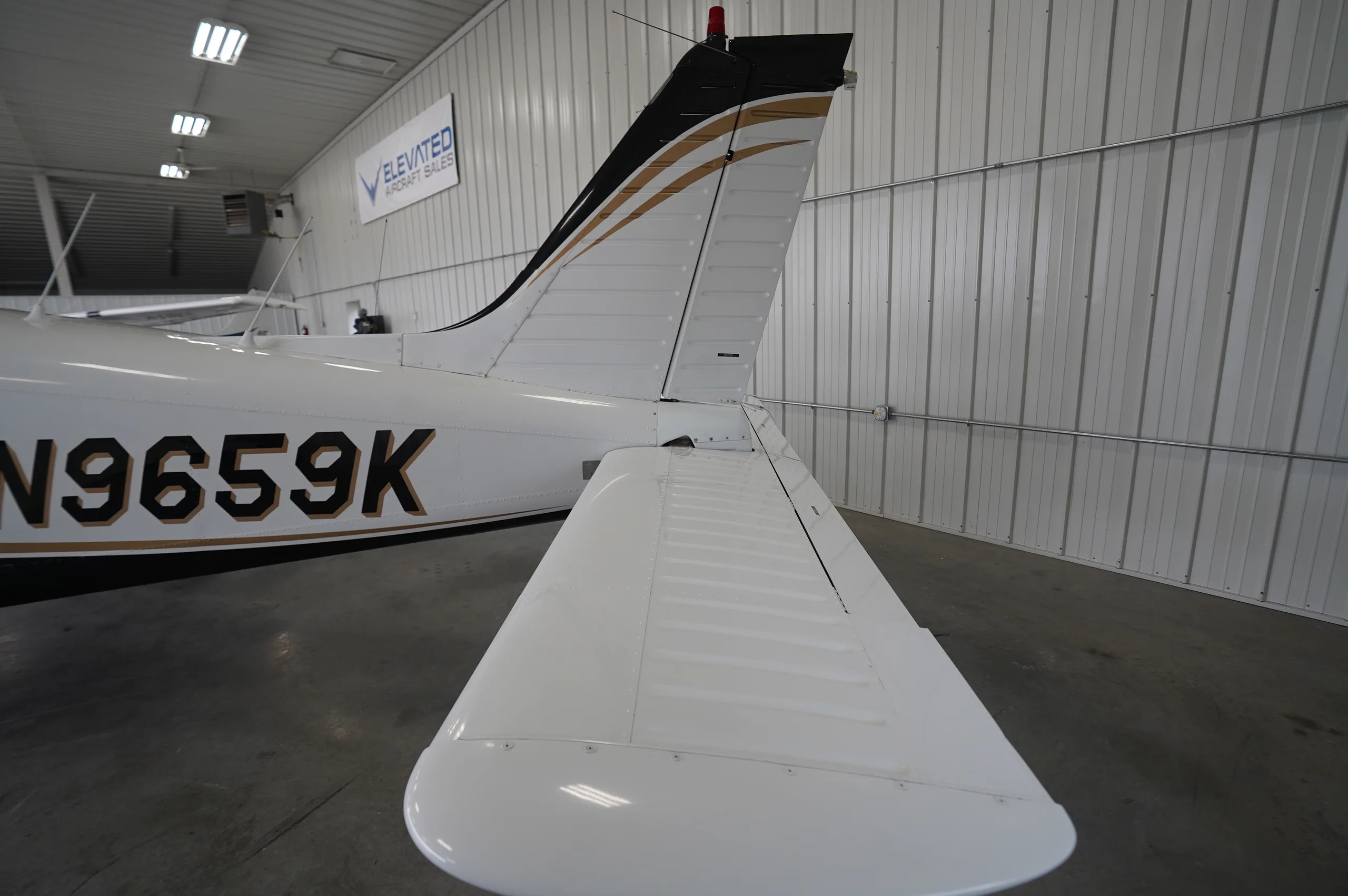 Exterior view of a 1976 Piper Arrow II, N9659K.