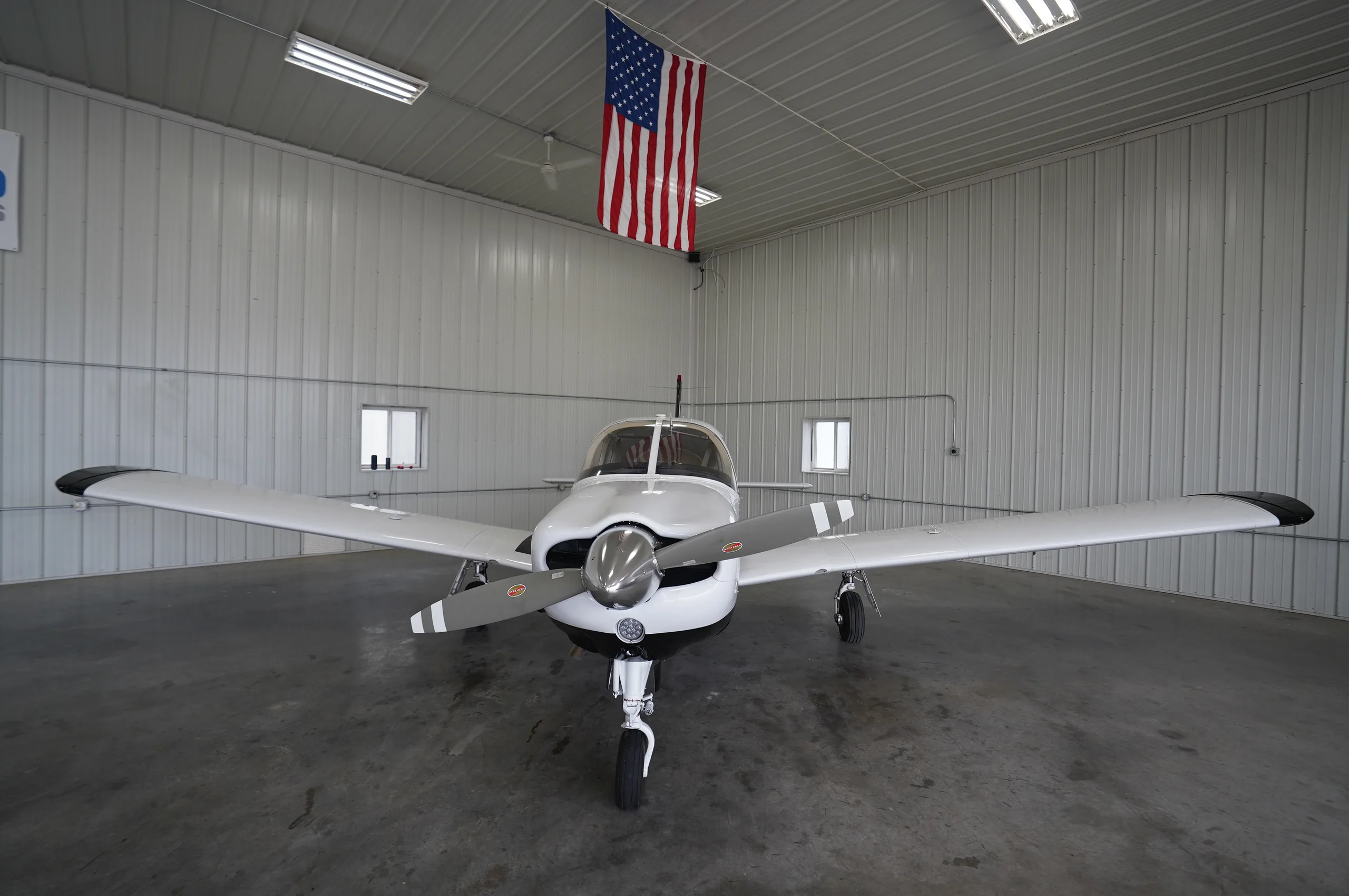 Exterior view of a 1976 Piper Arrow II, N9659K.