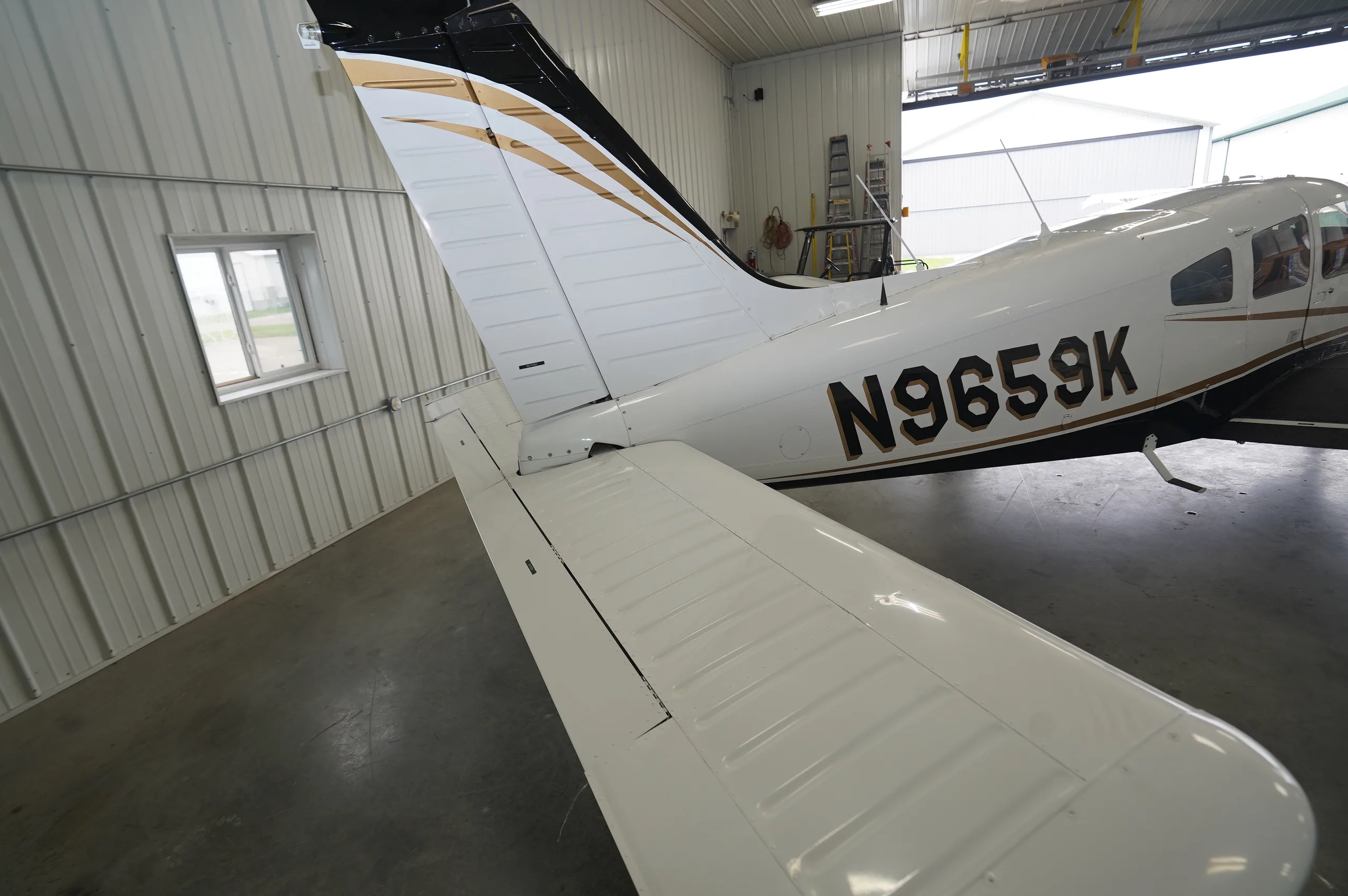 Exterior view of a 1976 Piper Arrow II, N9659K.