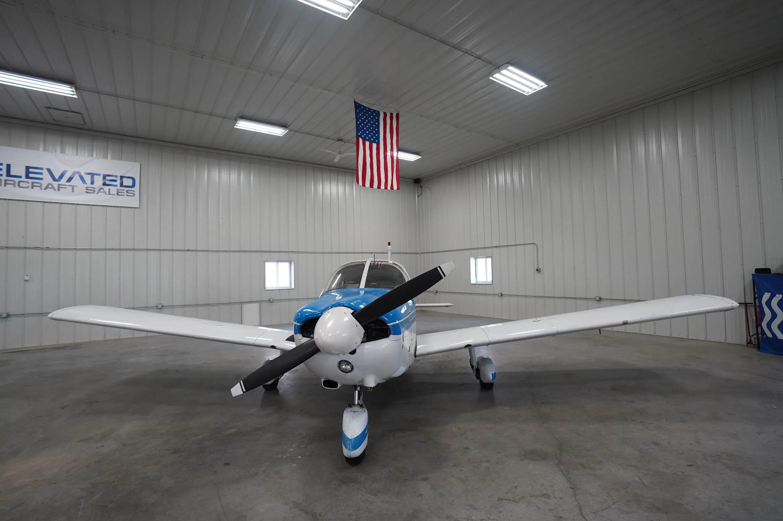 Exterior view of a 1966 Piper Cherokee 180, N9240J.