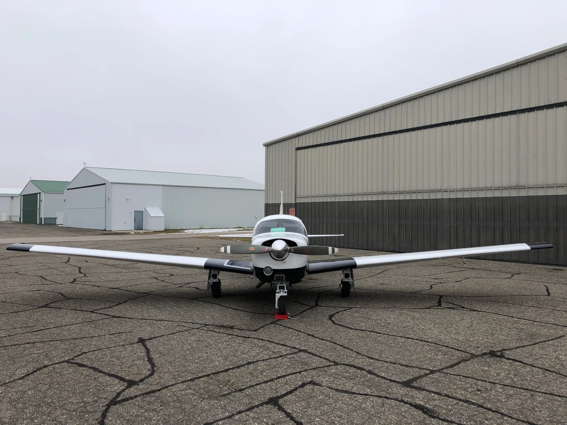 Exterior view of a 1967 Mooney M20F - Elite Air Service.