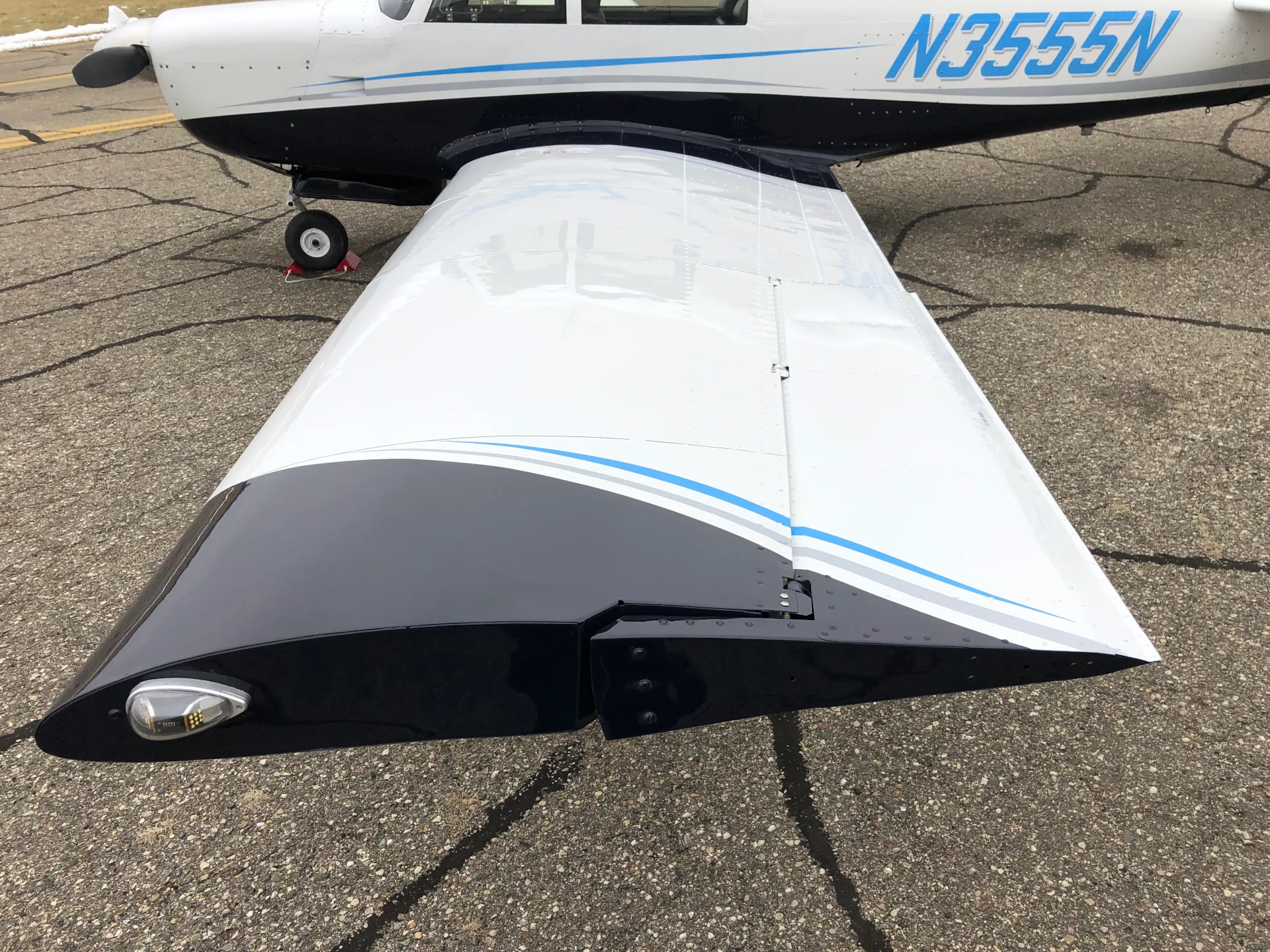 Exterior view of a 1967 Mooney M20F - Elite Air Service.