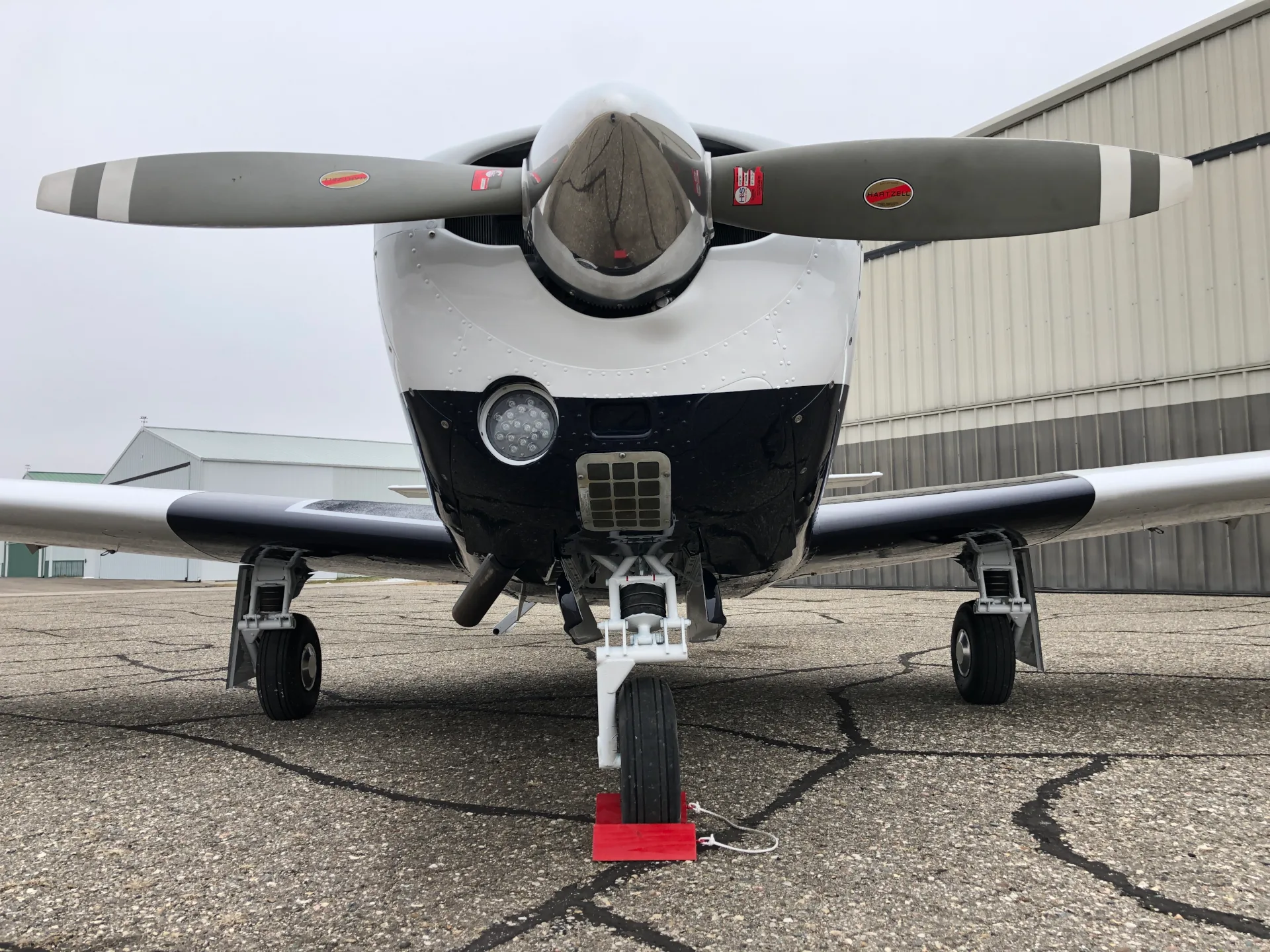 Exterior view of a 1967 Mooney M20F - Elite Air Service.