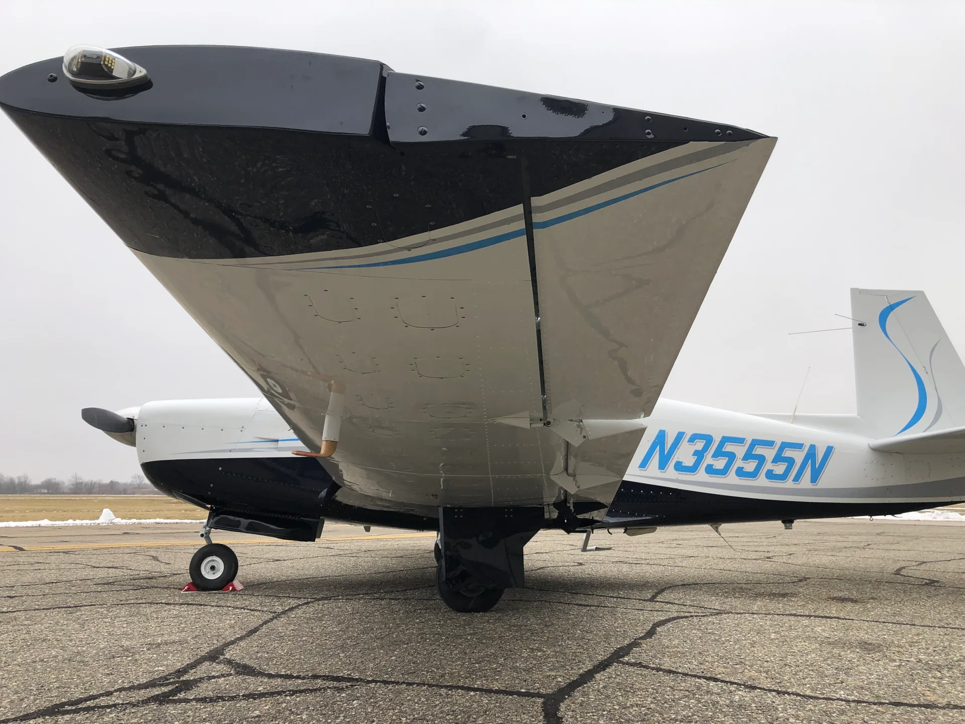 Exterior view of a 1967 Mooney M20F - Elite Air Service.